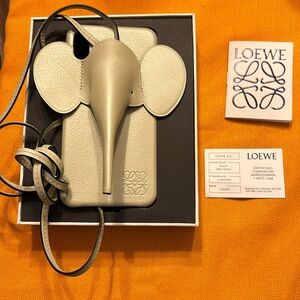 New in box Loewe light grey green elephant phone purse case